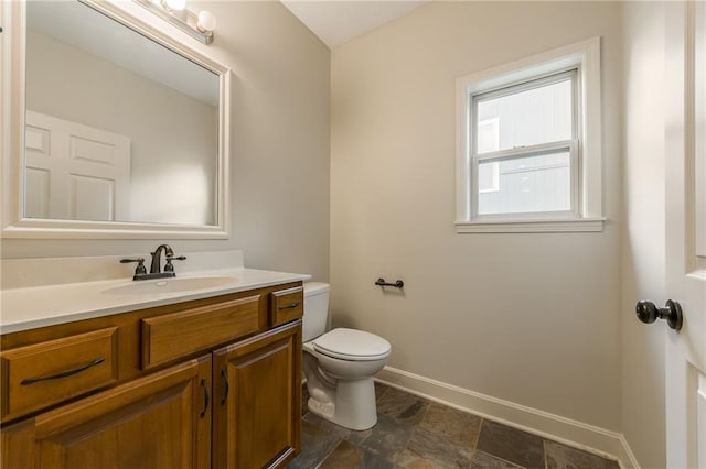 875 Clearview Dr, Lansing, KS 66043 - bathroom with vanity and stone finish flooring