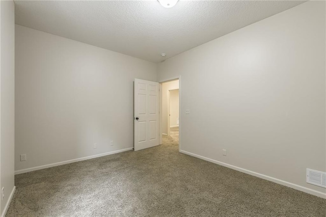 875 Clearview Dr, Lansing, KS 66043 - carpeted empty room featuring baseboards