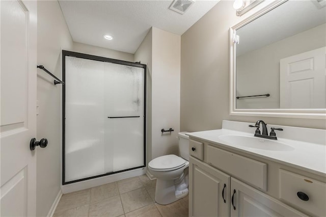 875 Clearview Dr, Lansing, KS 66043 - bathroom featuring vanity, a stall shower, recessed lighting, and tile patterned floors