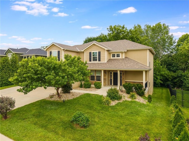875 Clearview Dr, Lansing, KS 66043 - traditional-style home with roof with shingles