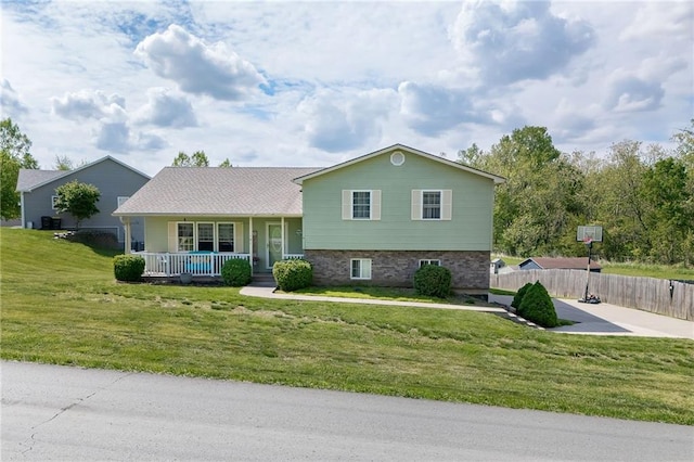 102 W Swenson Dr, Savannah, MO 64485 - split level home featuring a porch