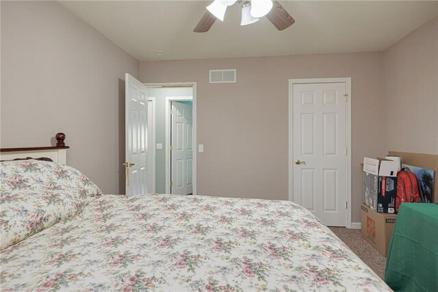 102 W Swenson Dr, Savannah, MO 64485 - carpeted bedroom featuring a ceiling fan
