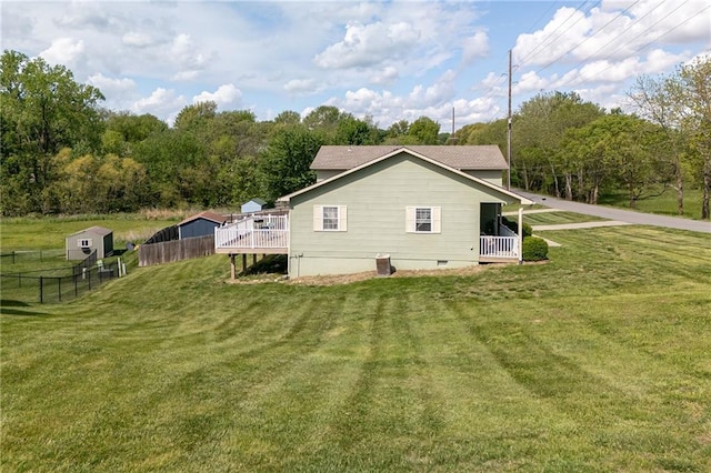 102 W Swenson Dr, Savannah, MO 64485 - back of property with crawl space