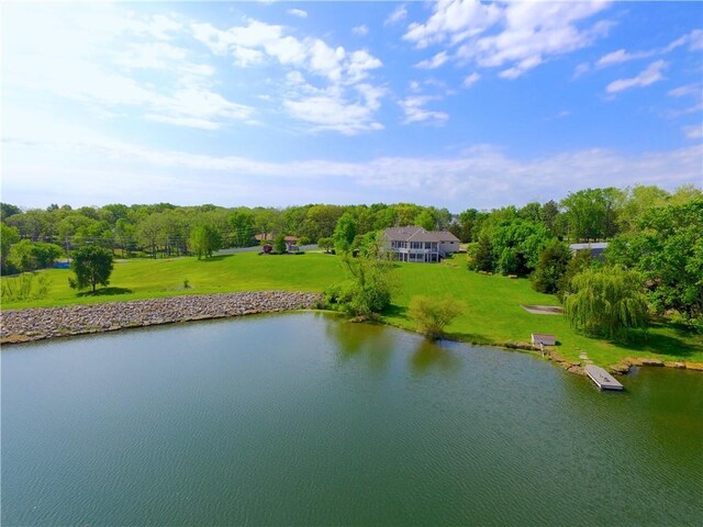 water view featuring a dock
