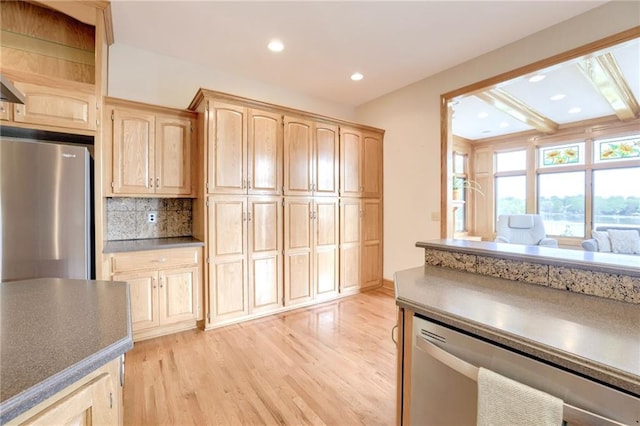 kitchen with fridge, stainless steel dishwasher, light brown cabinetry, light wood-style flooring, and recessed lighting