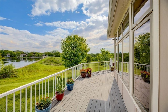 wooden terrace with a water view