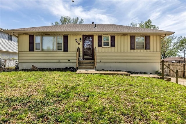 705 NW 88th Ter, Kansas City, MO 64155 - ranch-style home featuring fence, a front yard, and entry steps