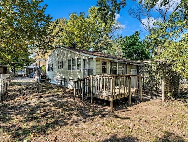 1619 Harvard Ave, Independence, MO 64052 - back of house featuring a deck, fence, and a gate