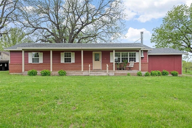 588 NW 105th Rd, Centerview, MO 64019 - single story home with brick siding, a front yard, and covered porch
