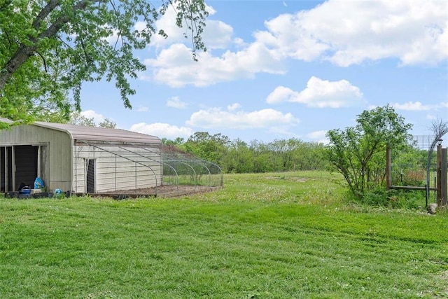 588 NW 105th Rd, Centerview, MO 64019 - view of green lawn with an outbuilding