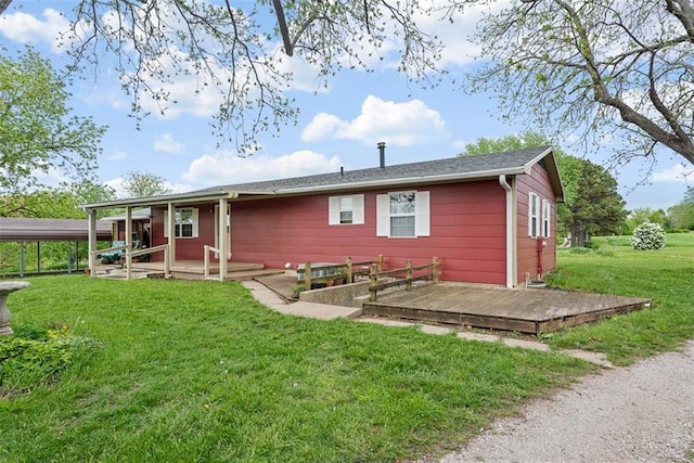 588 NW 105th Rd, Centerview, MO 64019 - rear view of house featuring a yard and a deck