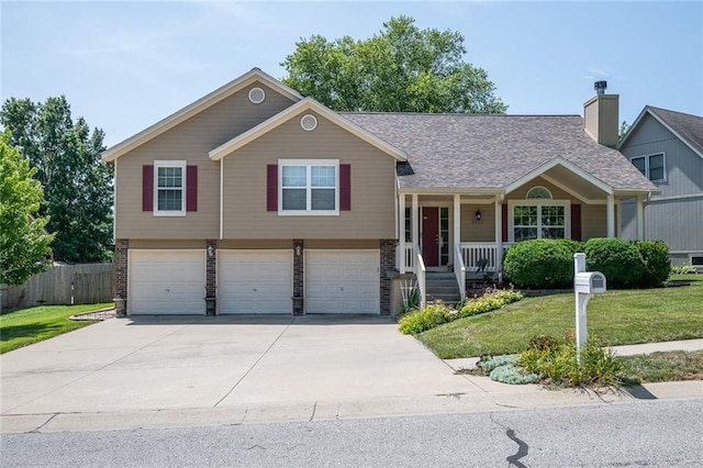 3616 Anchor Ct, Blue Springs, MO 64015 - view of front of property with a garage, covered porch, concrete driveway, and brick siding