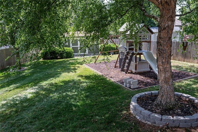 3616 Anchor Ct, Blue Springs, MO 64015 - fenced backyard with a playground
