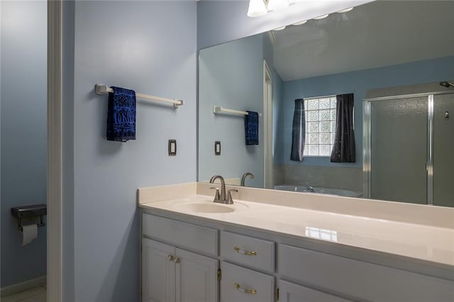 3616 Anchor Ct, Blue Springs, MO 64015 - full bathroom featuring a shower stall, a garden tub, and vanity