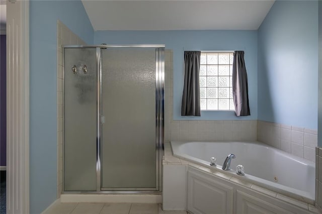 3616 Anchor Ct, Blue Springs, MO 64015 - bathroom featuring a shower stall, a tub with jets, and tile patterned floors