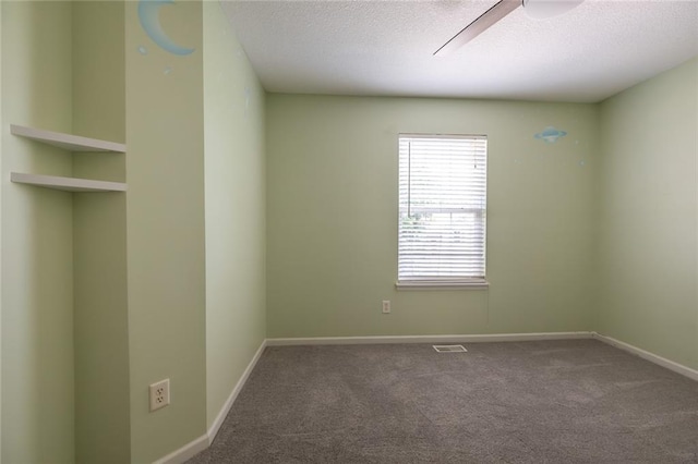 3616 Anchor Ct, Blue Springs, MO 64015 - spare room featuring plenty of natural light, carpet flooring, a textured ceiling, and ceiling fan