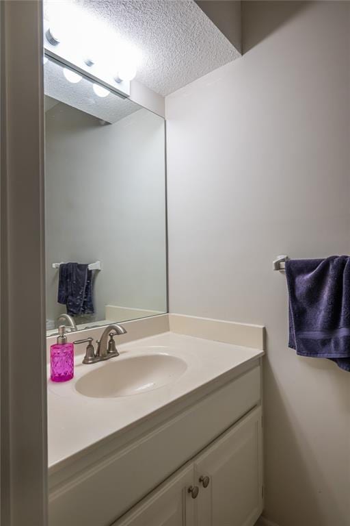 3616 Anchor Ct, Blue Springs, MO 64015 - bathroom featuring vanity and a textured ceiling
