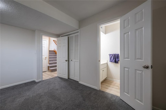 3616 Anchor Ct, Blue Springs, MO 64015 - unfurnished bedroom featuring carpet flooring, a closet, and ensuite bath