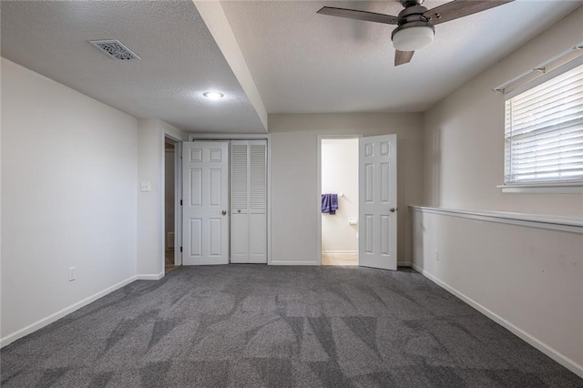3616 Anchor Ct, Blue Springs, MO 64015 - unfurnished bedroom with a textured ceiling, carpet flooring, a closet, and ceiling fan