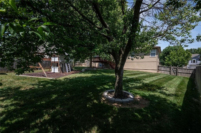 3616 Anchor Ct, Blue Springs, MO 64015 - fenced backyard with a playground