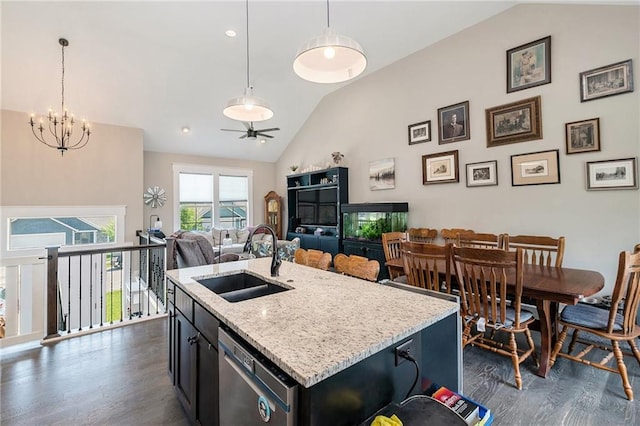 kitchen featuring a sink, stainless steel dishwasher, dark wood-type flooring, a chandelier, and high vaulted ceiling