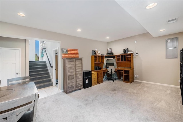 carpeted office with electric panel, recessed lighting, and baseboards
