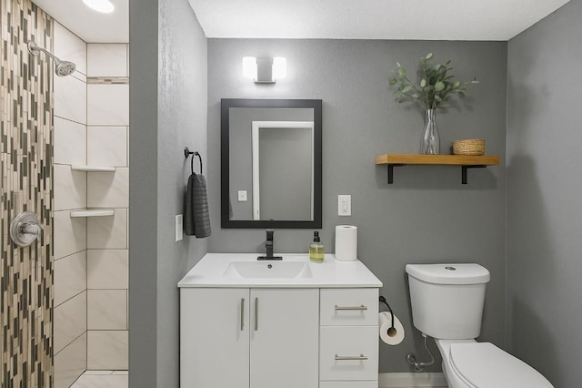 157 Clark Ave, Bonner Springs, KS 66012 - full bath with toilet, a tile shower, and vanity