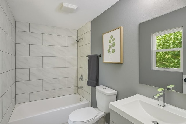 157 Clark Ave, Bonner Springs, KS 66012 - bathroom featuring toilet, vanity, and washtub / shower combination