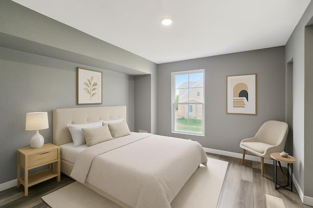 157 Clark Ave, Bonner Springs, KS 66012 - bedroom with baseboards, light wood-type flooring, and recessed lighting