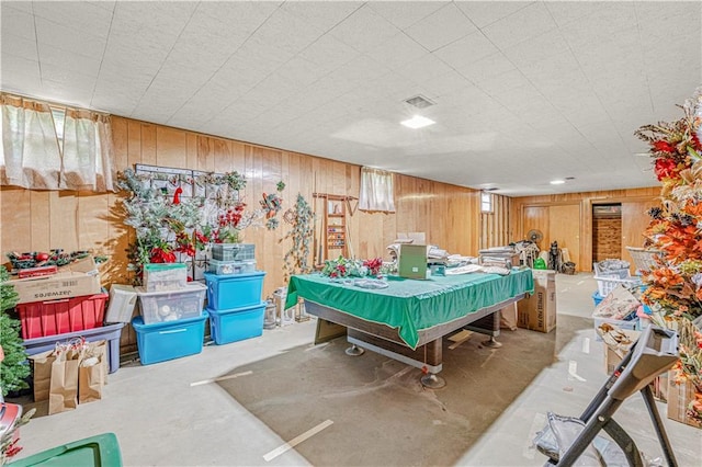 8739 Lafayette Ave, Kansas City, KS 66109 - game room featuring wooden walls, concrete floors, and billiards table