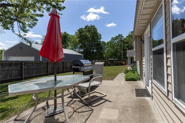 403 S 2nd St, Drexel, MO 64742 - view of patio / terrace featuring fence, area for grilling, and outdoor dining space