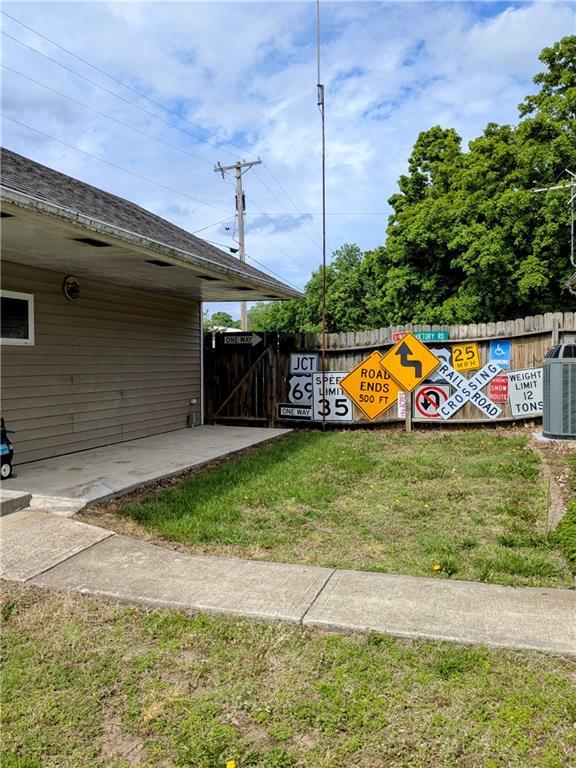 403 S 2nd St, Drexel, MO 64742 - view of yard featuring central AC
