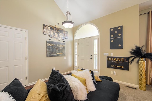 5912 NE Hidden Valley Dr, Lees Summit, MO 64064 - carpeted foyer featuring baseboards and high vaulted ceiling