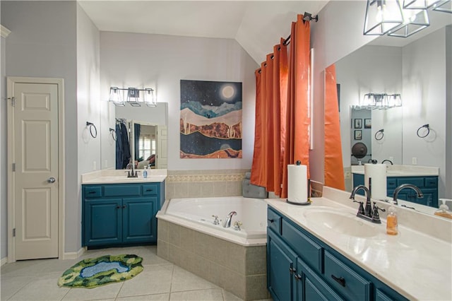 5912 NE Hidden Valley Dr, Lees Summit, MO 64064 - full bathroom featuring tile patterned floors, a garden tub, two vanities, and lofted ceiling
