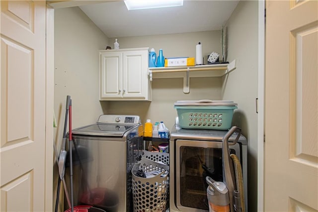5912 NE Hidden Valley Dr, Lees Summit, MO 64064 - laundry area with washer and dryer and cabinet space