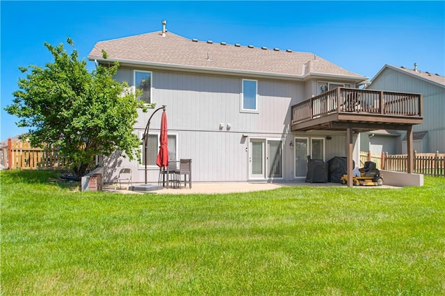5912 NE Hidden Valley Dr, Lees Summit, MO 64064 - rear view of house with a deck, a patio area, and a shingled roof