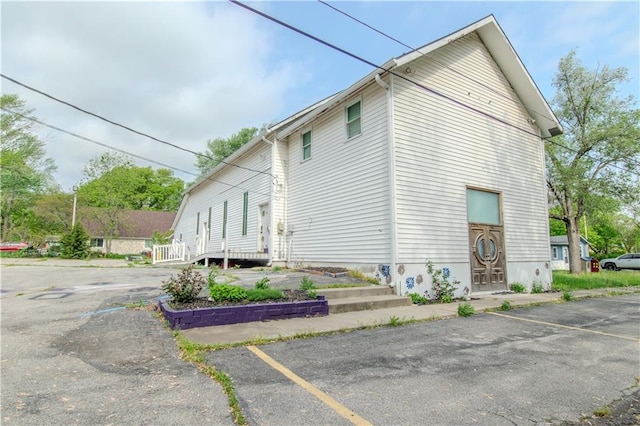 306 S Texas St, Archie, MO 64725 - view of side of home featuring uncovered parking
