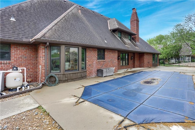 9000 W 104th St, Overland Park, KS 66212 - view of swimming pool featuring fence, a fenced in pool, and a patio area