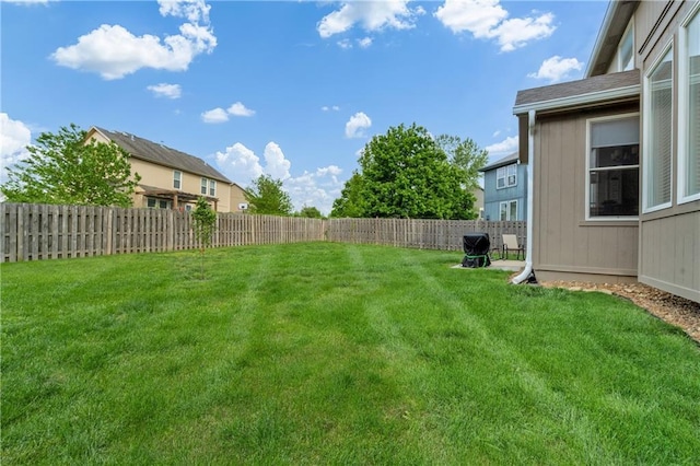 view of yard featuring a fenced backyard