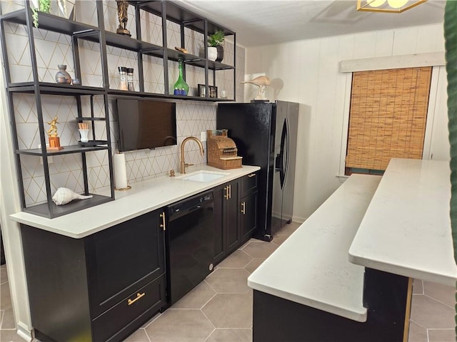 606 W Red Bridge Rd, Kansas City, MO 64114 - kitchen featuring black appliances, open shelves, a sink, dark cabinetry, and light tile patterned floors