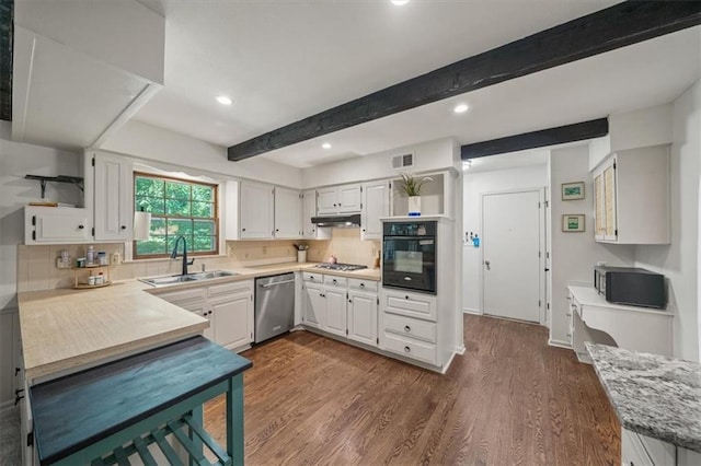 606 W Red Bridge Rd, Kansas City, MO 64114 - kitchen with dishwasher, black oven, gas cooktop, beam ceiling, and dark wood finished floors