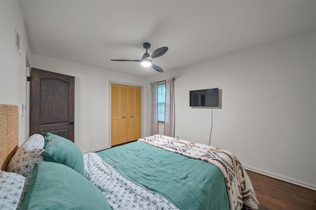 606 W Red Bridge Rd, Kansas City, MO 64114 - bedroom with wood finished floors, a closet, and a ceiling fan