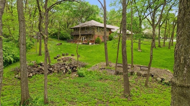 606 W Red Bridge Rd, Kansas City, MO 64114 - view of grassy yard with a wooden deck