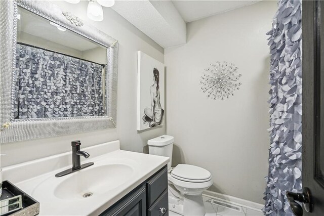  - full bath featuring vanity, visible vents, and toilet
