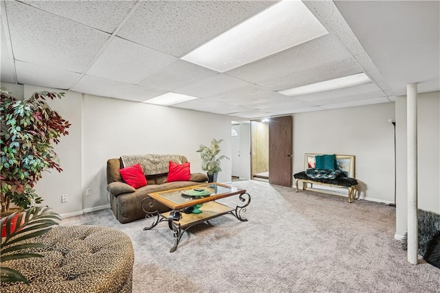  - carpeted living room with baseboards and a paneled ceiling