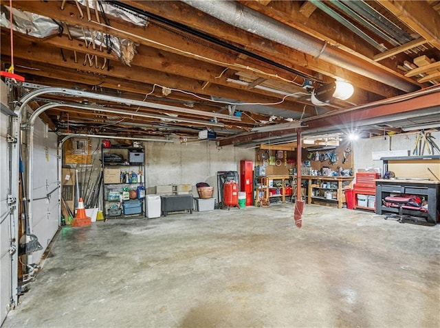  - unfinished below grade area featuring a workshop area