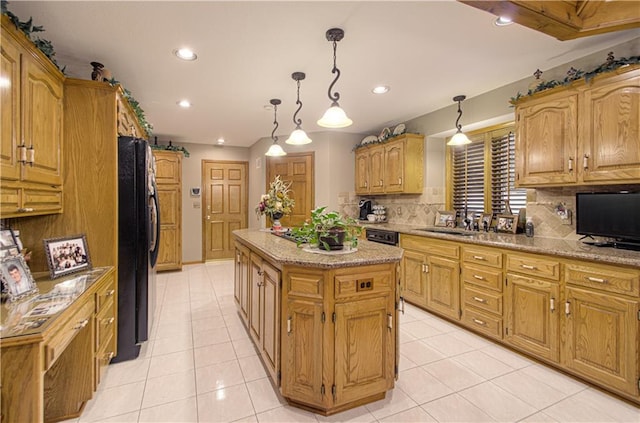kitchen featuring a kitchen island, tasteful backsplash, black appliances, and recessed lighting