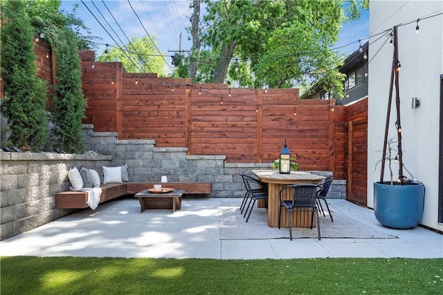 4727 Liberty St, Kansas City, MO 64112 - view of patio / terrace with fence and outdoor dining area