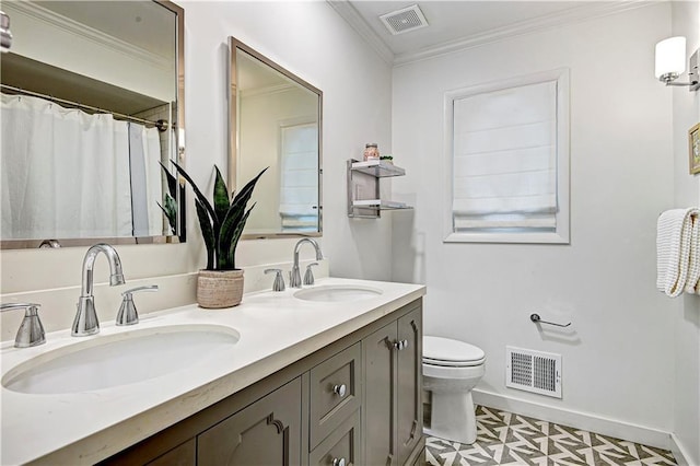 full bathroom featuring baseboards, toilet, ornamental molding, and double vanity