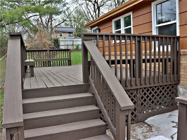 3417 Jackson Ave, Kansas City, MO 64128 - wooden terrace featuring stairway